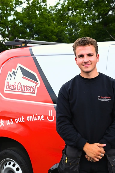 our gutter cleaner in Lincoln standing by company vehicle